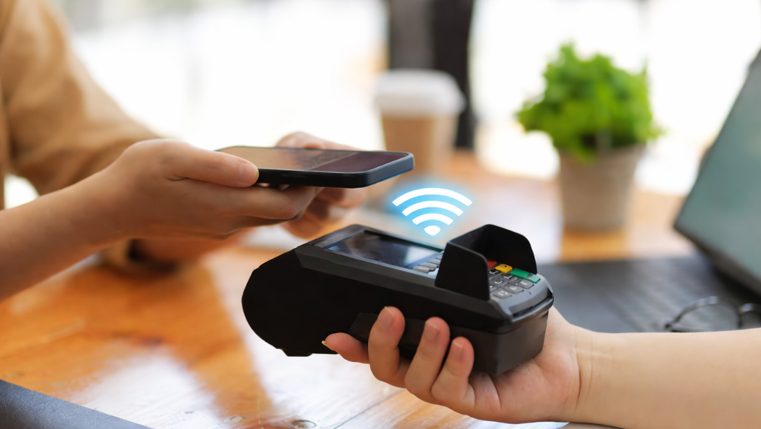 UK customer approving a pay by bank payment on a mobile phone